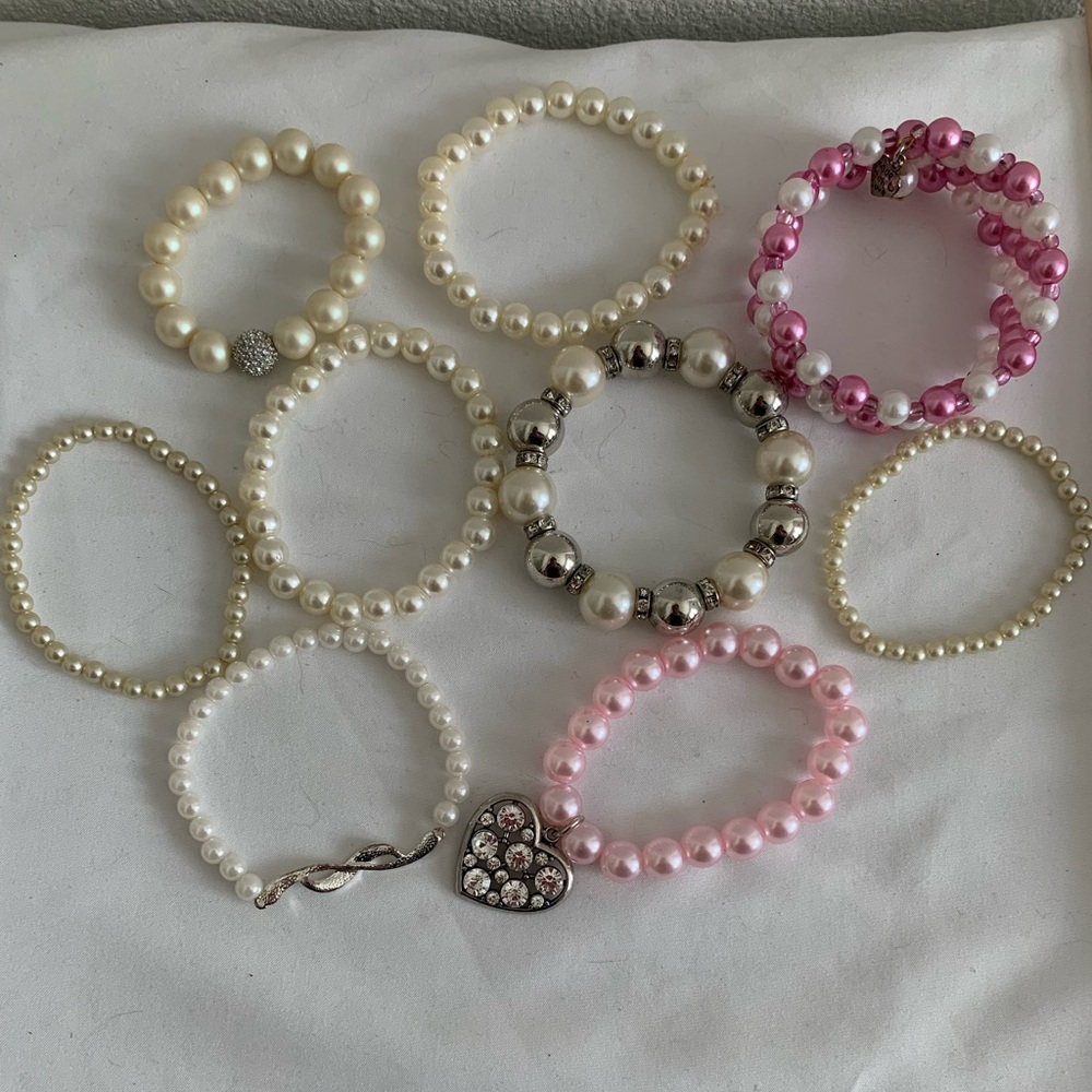 9 faux pearl bracelets. Stretch. Memory wire. Wearable. Sellable.